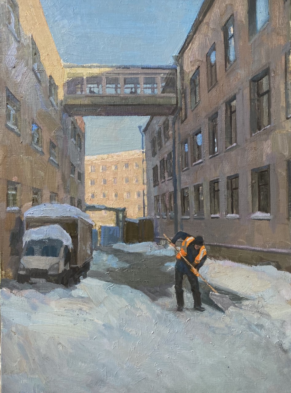 Уборка заснеженной улочки